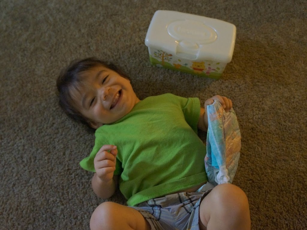 Diaper changing a baby