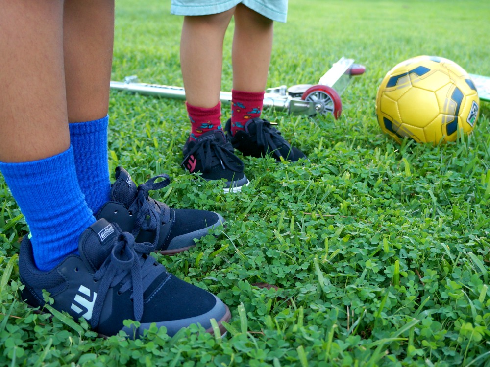 kids standing on grass