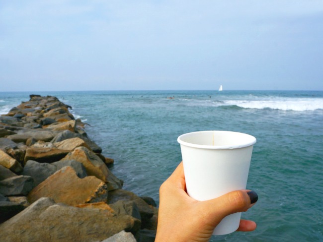 Coffee with ocean background