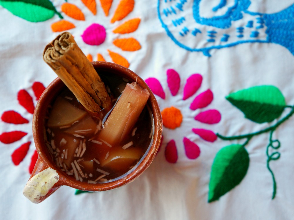 How to make Mexican punch (Ponche Navideño) using a simple recipe at home. Great for a big crowd! LivingMiVidaLoca.com | #MexicanRecipe #MexicanPunch #ChristmasPunch #TraditionalMexicanPunch #PoncheNavideno #RumPunch #ChristmasRecipes #ChristmasPartyRecipes