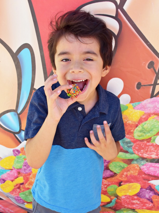 boy enjoying a Fruit Pebbles treat