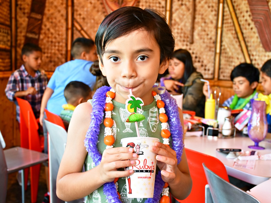 Celebrating a boy's birthday at Ruby's Diner in San Clemente. Ruby's Diner is a great birthday party place because they have a Tiki Room - LivingMiVidaLoca.com