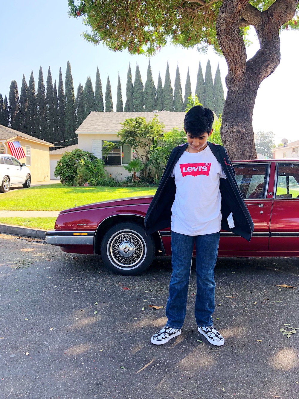 Levi's t-shirt and black Jordan sweater at Macy's at MainPlace Mall in Santa Ana | livingmividaloca.com | #livingmividaloca #shopmainplace #santaana #mainplacemall #macys