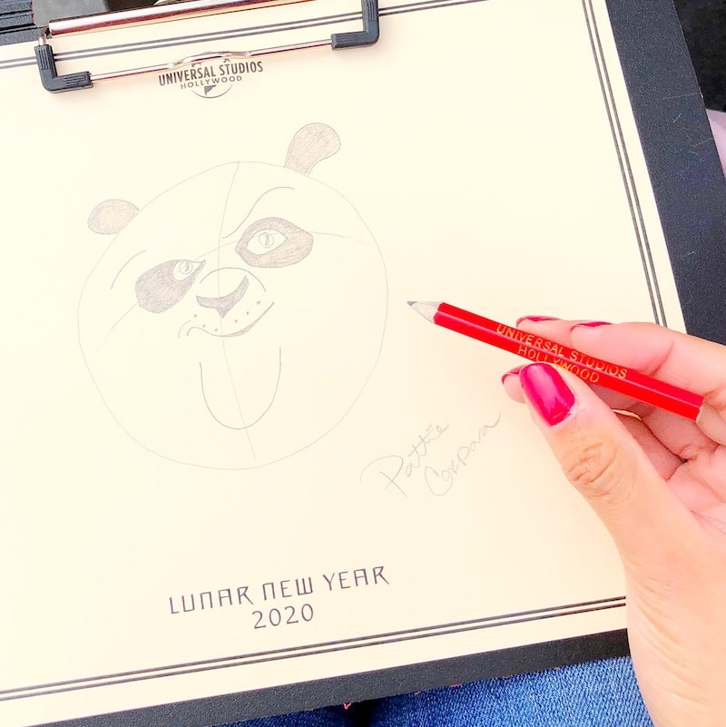 Guests can participate in a "Po" drawing demonstration at Universal Plaza. - livingmividaloca.com